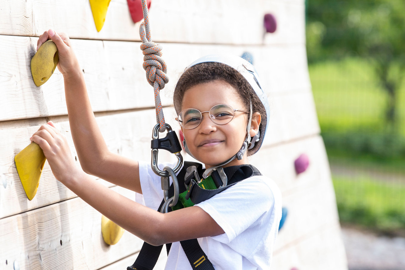 Black Girl Climbing Wall