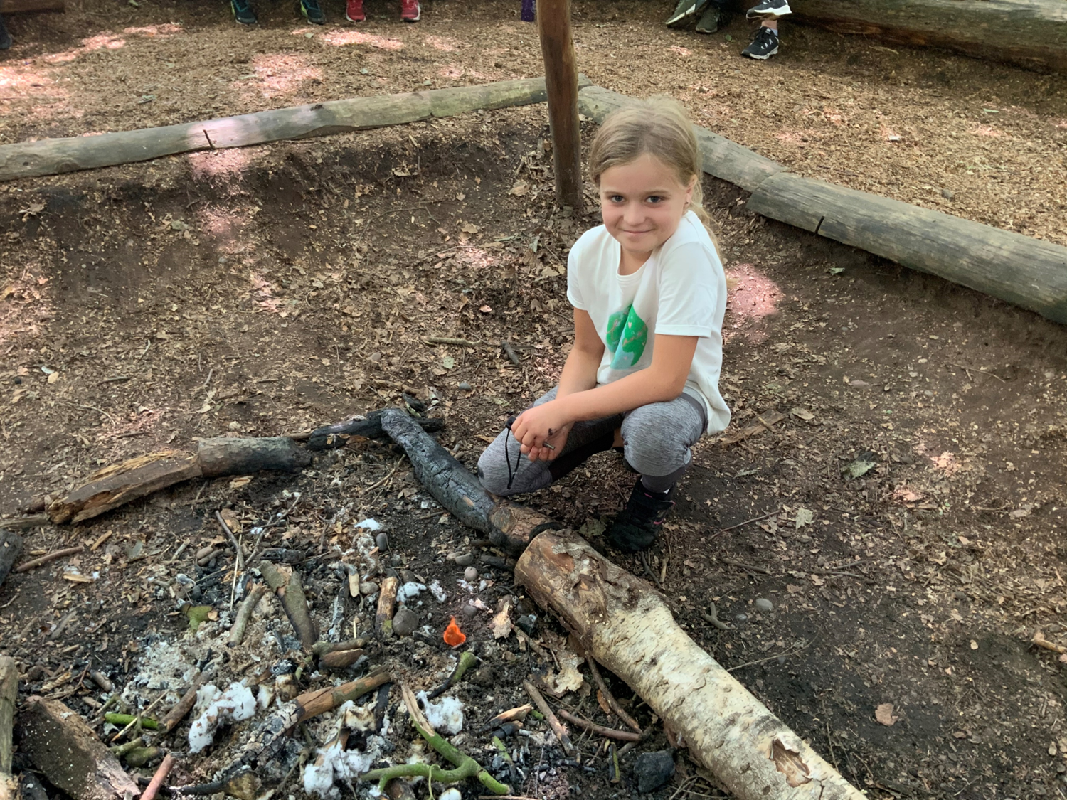 Camp Redwood Fire Lighting Girl